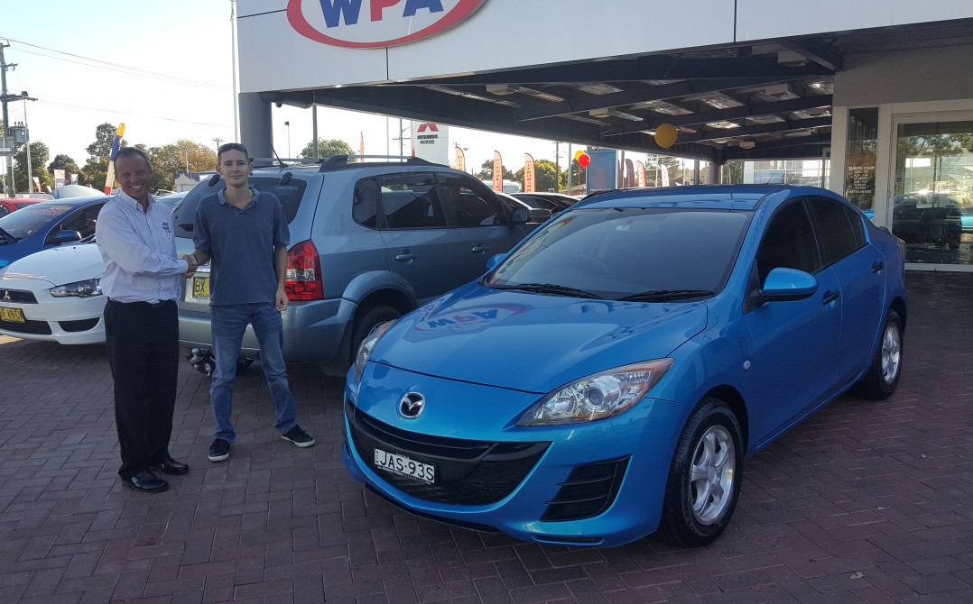 My mazda the day i bought it