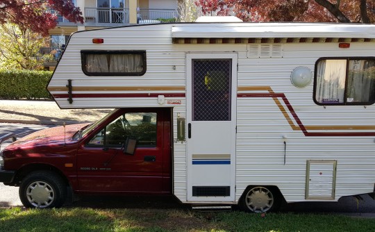 1988 Holden Rodeo with austar cab over camper.